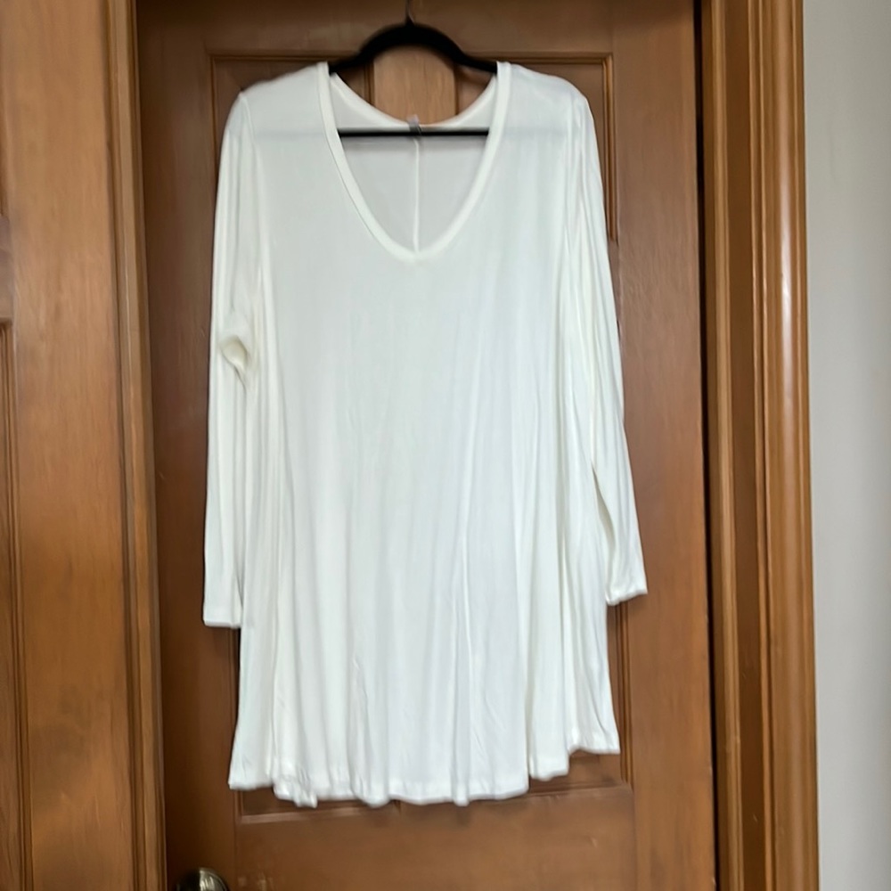 Cream colored jersey tunic. I have lost weight and this is now too big